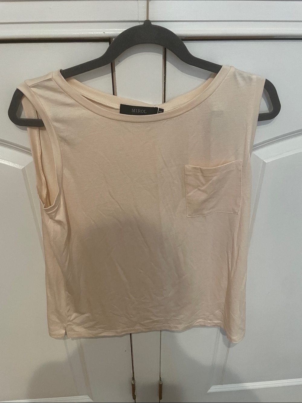 Mirol Women's Sleeveless Pocket Tank Top in Light Peach